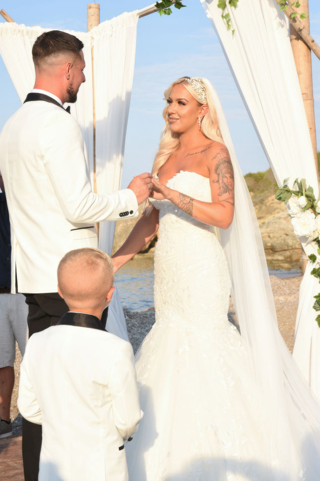 Bride and groom kissing 
